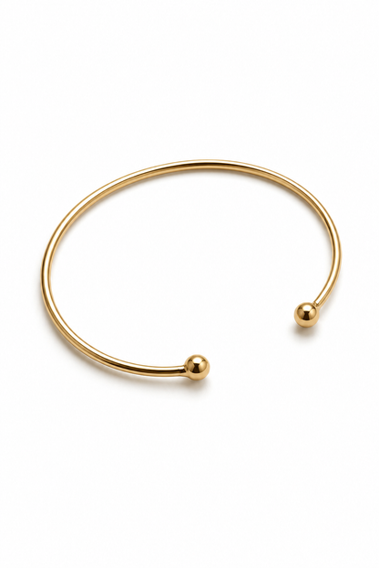 Tija – 18k apzeltīta bangle rokassprādze ar bumbiņu galiem